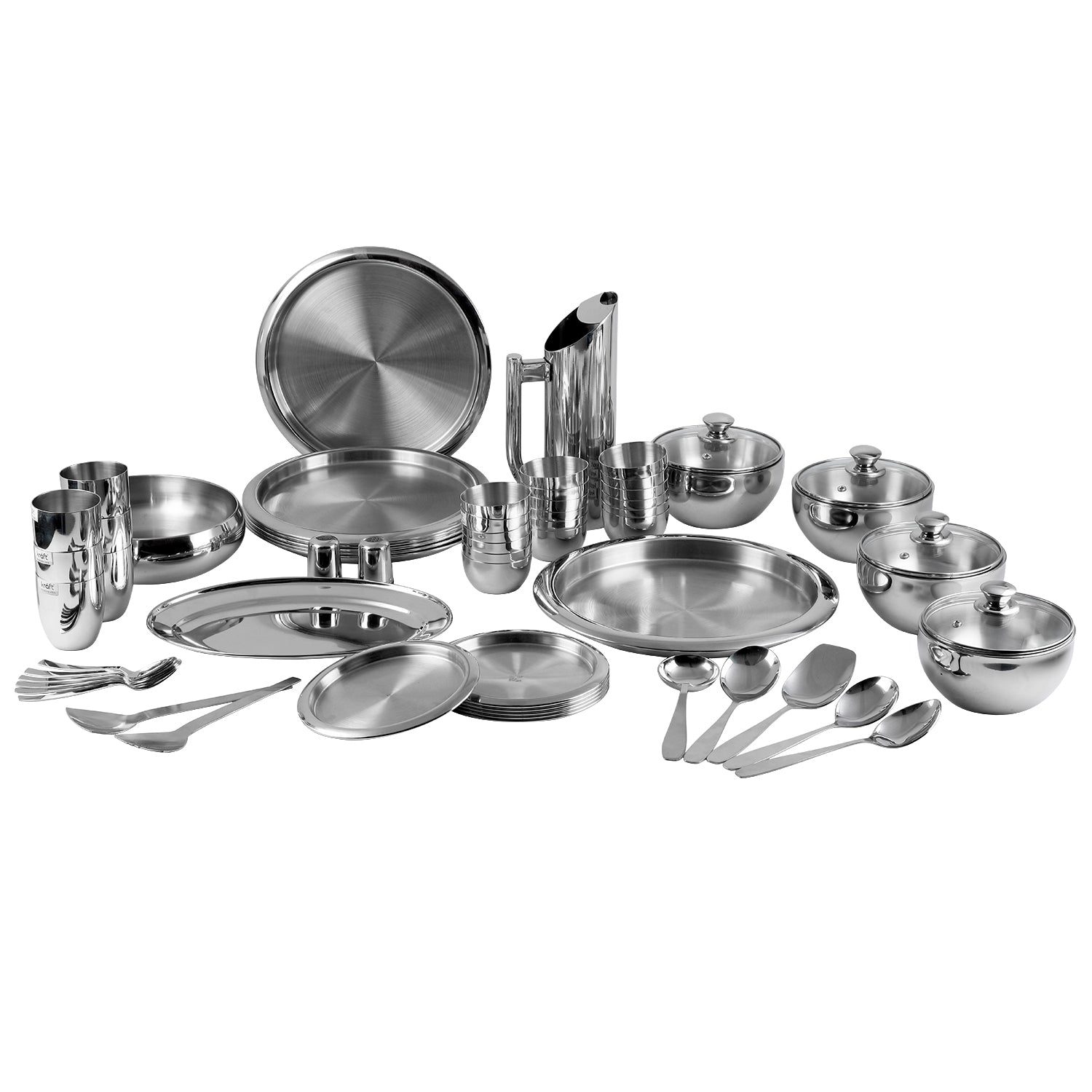 Complete stainless steel dinnerware set with plates, bowls, serving utensils, glasses, and a jug displayed on a white background