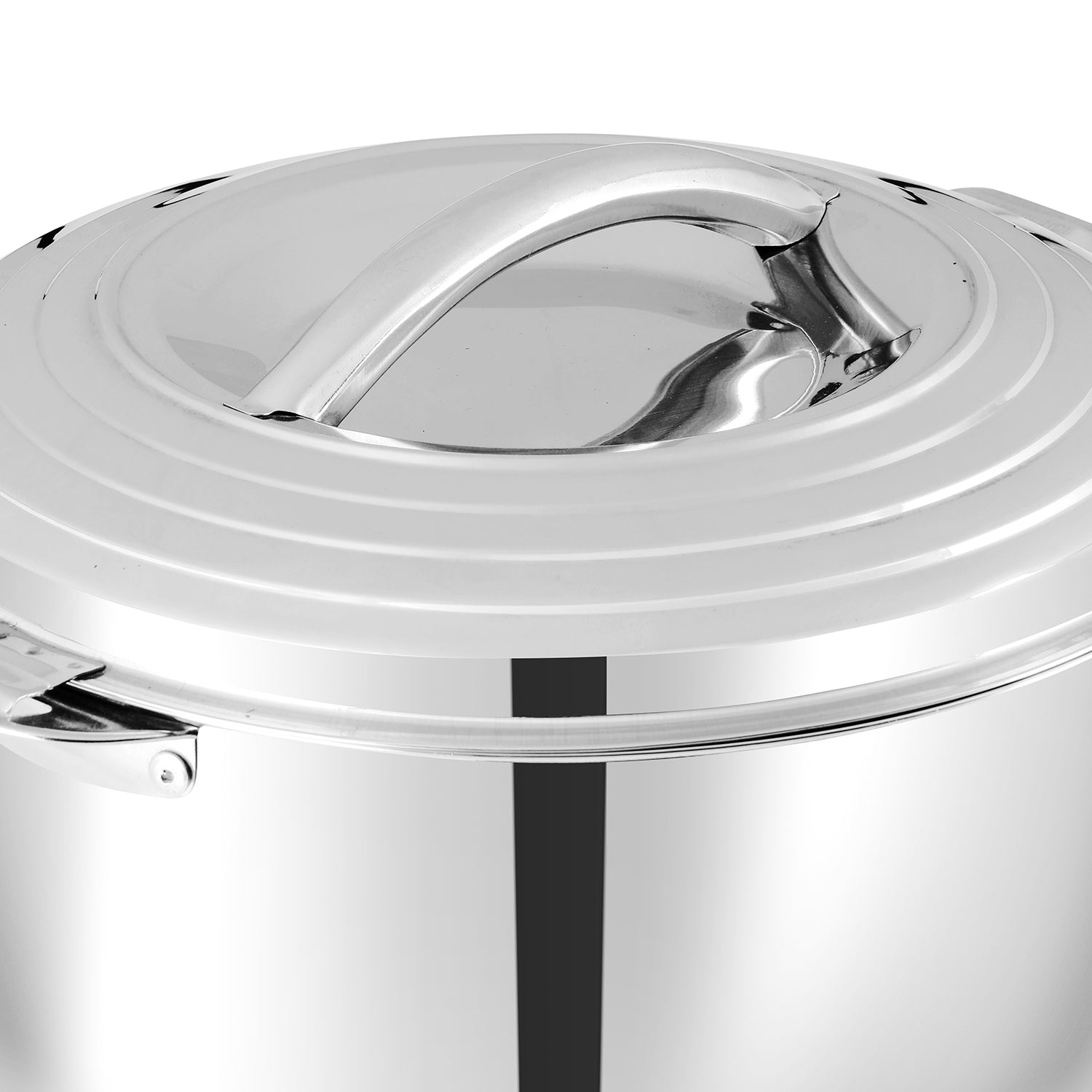 Mars stainless steel casserole in kitchen setting with chapati and bread showing serving use