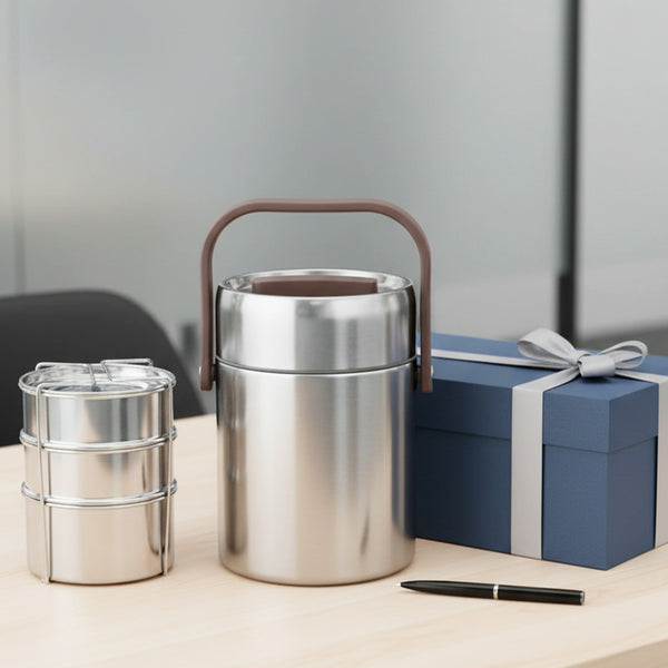 Perma-Therm Tiffin shown with gift box on the right side and pen on table